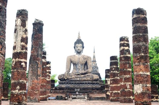 Statue of a deity in the Historical Park of Sukhothai, Thailand