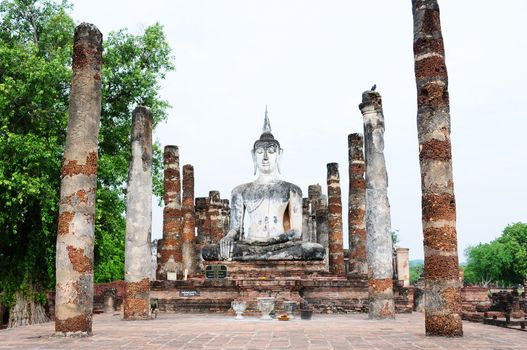 Statue of a deity in the Historical Park of Sukhothai, Thailand