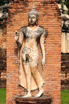 Statue of a deity in the Historical Park of Sukhothai, Thailand