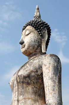 Statue of a deity in the Historical Park of Sukhothai, Thailand