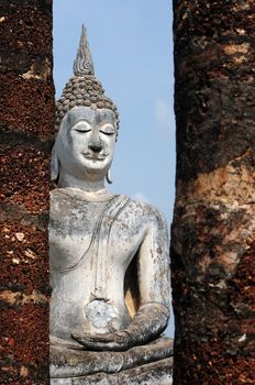 Statue of a deity in the Historical Park of Sukhothai, Thailand