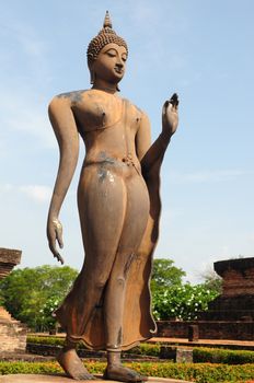 Statue of a deity in the Historical Park of Sukhothai, Thailand