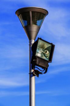 Spotlight and blue sky in the sunny day