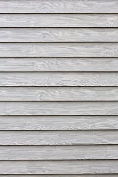 White color  wooden wall outside of building