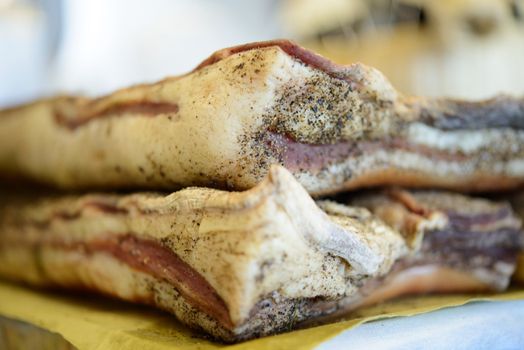 Tuscan pancetta, traditional smoked pork meat product