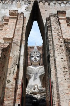 Statue of a deity in the Historical Park of Sukhothai, Thailand
