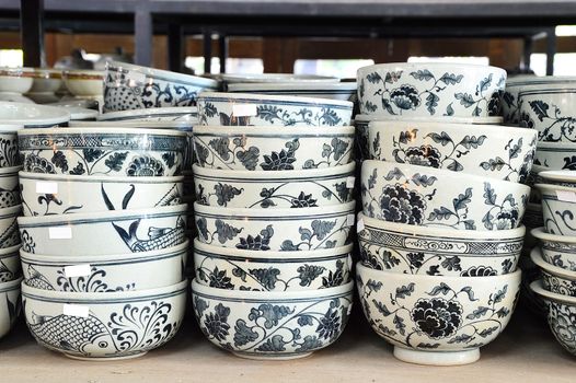 stack of ceramic bowl in outdoor market