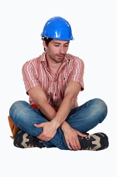 Tired looking construction worker
