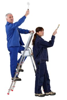 Man and woman redecorating