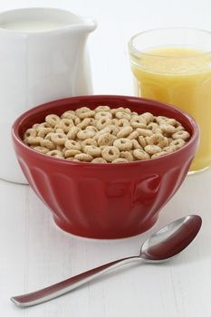 Delicious and nutritious lightly toasted honey, nuts and oats cereal with milk.