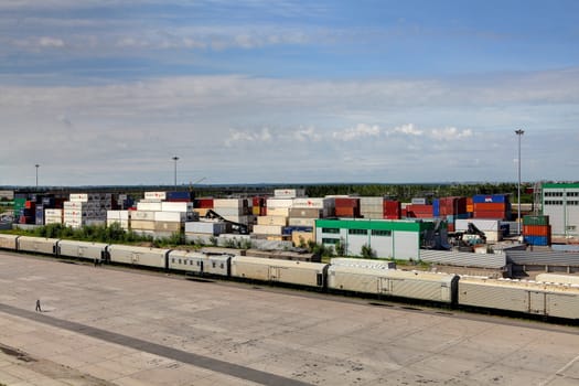 ST-PETERSBURG, RUSSIA - JUNE 13: Container Transportation in Russia, container terminal with ship containers, June 13, 2013.