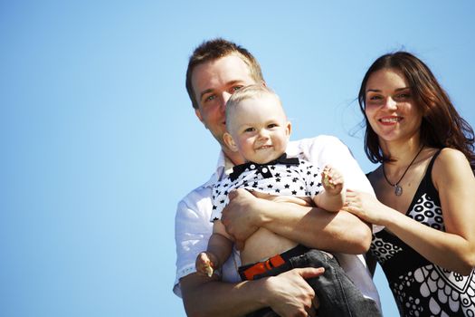 happy family blue sky on background