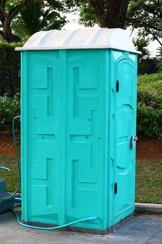 Green color Portable toilet ready to service people for outdoor event