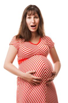 Pregnancy and new life concept - amazed or surprised pregnant woman touching or bonding her abdomen
