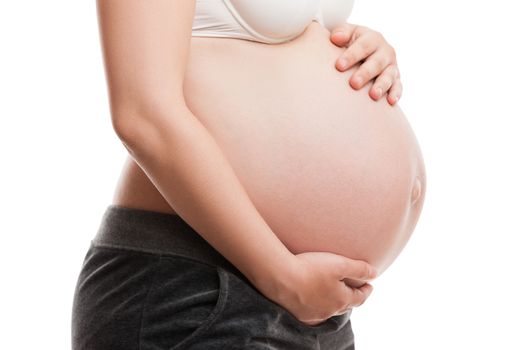 Pregnancy and new life concept - beauty pregnant woman lovely touching or bonding her abdomen