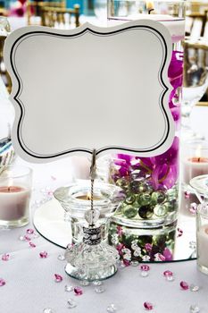 Close up of a card holder on a wedding table