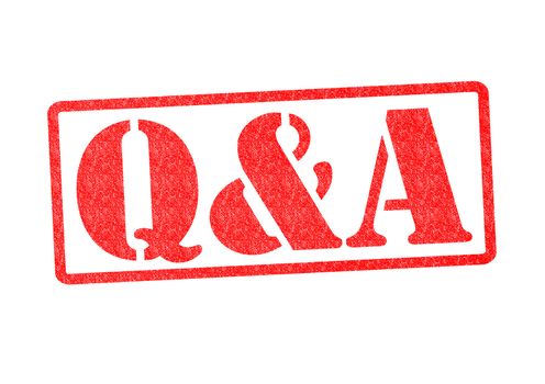 Q&A Rubber Stamp over a white background.