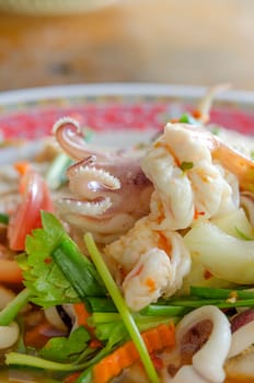 close up spicy mix salad with seafood   and  fresh vegetable
