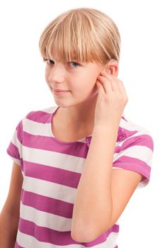 Hearing aid - Young Girl setting her hearing aid. Isolated on white.