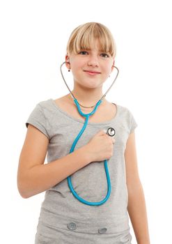 Self doctor - Young female checking herself wiht a stethoscope 