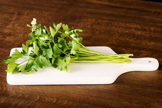 Green parsley on table