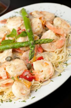 Italian style shrimp scampi pasta dish with spaghetti.