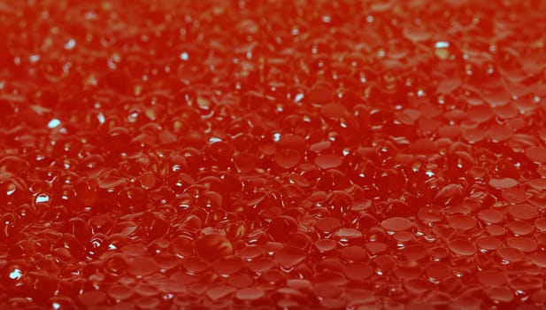 Red salted caviar closeup, backdrop