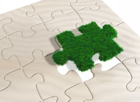 a last missing puzzle piece made of grass is going to be inserted in a puzzle made of sand