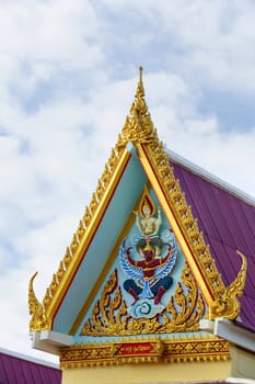 front of Thai Temple with purple roof tiles