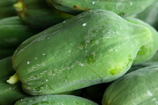 Green papaya sale in market of Thailand