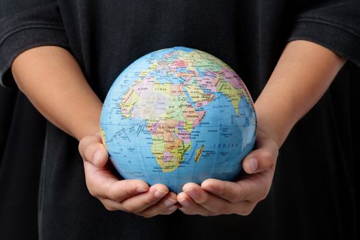 Save the Earth : Globe in two palm hands