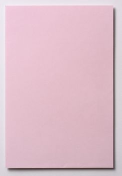 Light pink note paper isolated on white