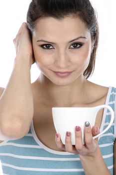 Model Released. Woman Drinking a Cup of Tea