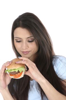 Model Released. Woman Eating Homemade Beefburger