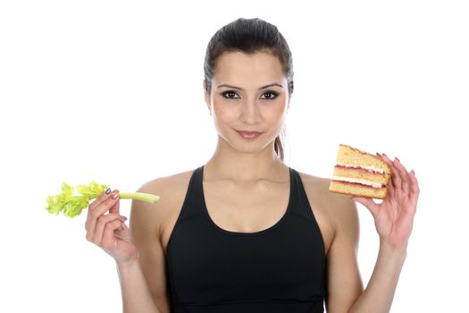 Model Released. Woman Holding comparing good bad food Cake and Celery