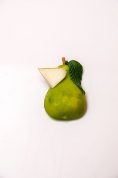 Magnet green pear to paste in the fridge