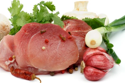 Boneless Raw Pork with Parsley, Spring Onion, Garlic, Edible Mushrooms and Spices isolated on white background