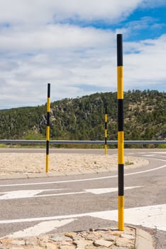 Snow poles on a mountain road ready for winter