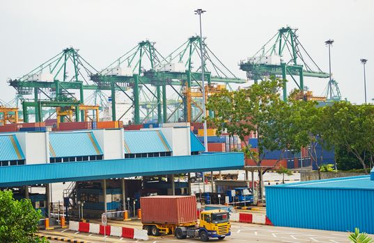 Singapore commercial port. It's the world's busiest port in terms of total shipping tonnage, it transships a fifth of the world shipping containers
Stock Photo:
