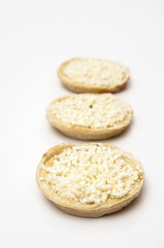 small pizza cheese on a white background