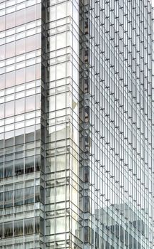 Close up vertical shot of a office building.