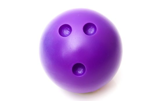 Lilac bowling ball on a white background