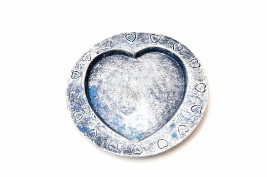 heart shaped ashtray on a white background