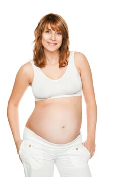 Pregnant woman smiling at camera isolated on white