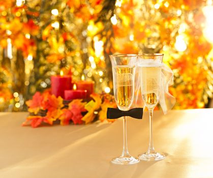 Champagne glasses with conceptual heterosexual decoration for straight couples
