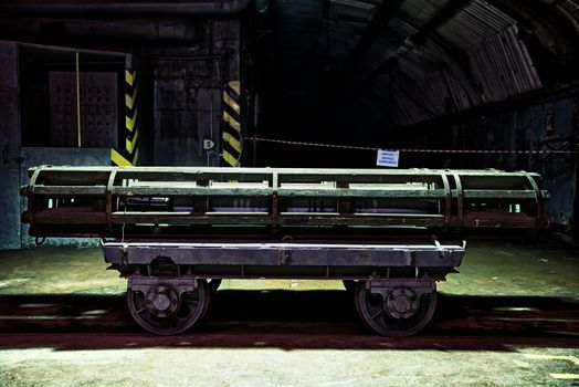 gun shell on a transport cart .