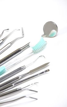 dental health care, toothbrush and mirror