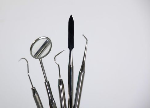 Set of metal medical equipment tools for teeth dental care