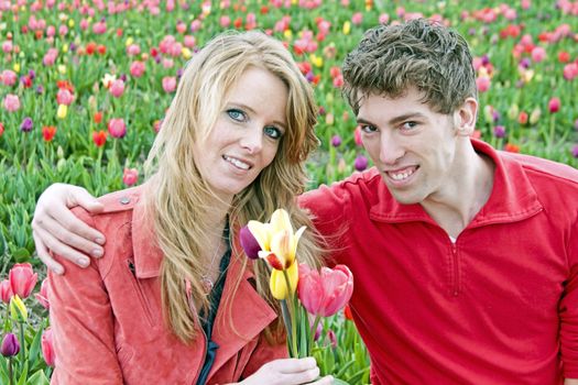 Happy couple in the tulipfields from the Netherlands