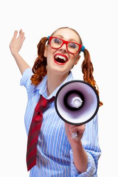 Young funny woman in red glasses holding megaphone